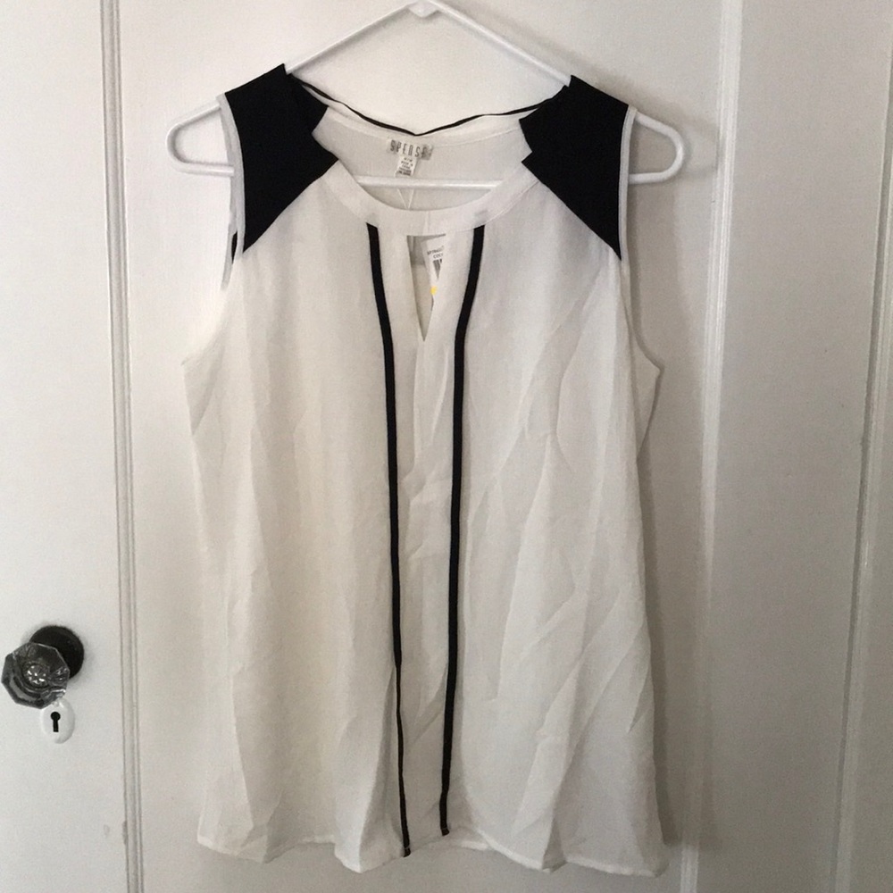 White blouse with black trim